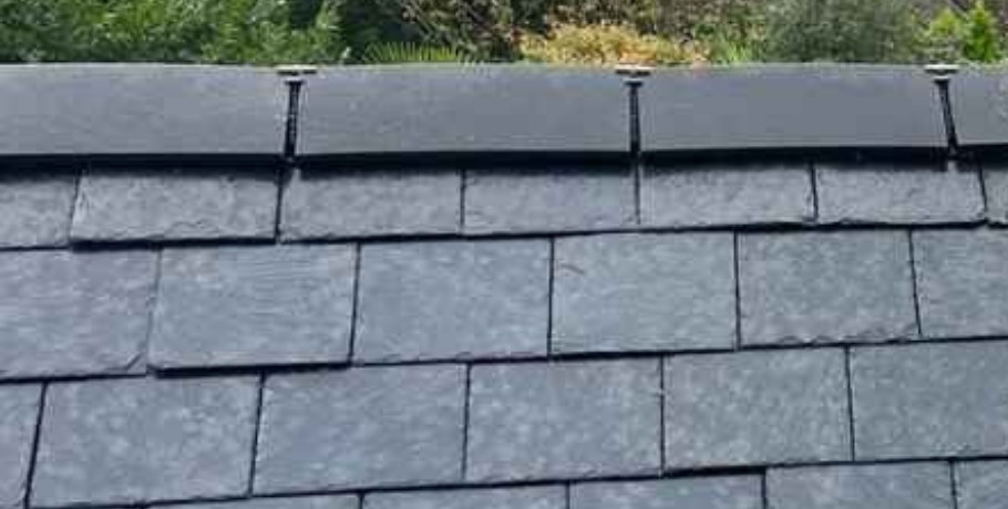 Clean, freshly coated roof after expert roof spraying and painting by Central Scotland roof specialists